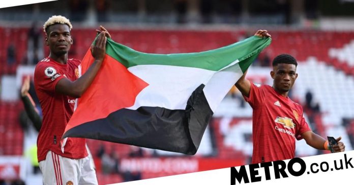 Man Utd star Paul Pogba wears the flag of Palestine around Old Trafford

