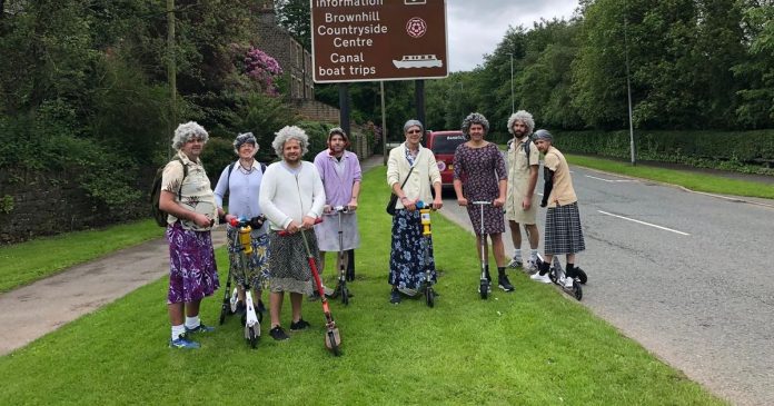 Why eight football fans disguised as grandmas will ride scooters from Anfield to Old Trafford travel

